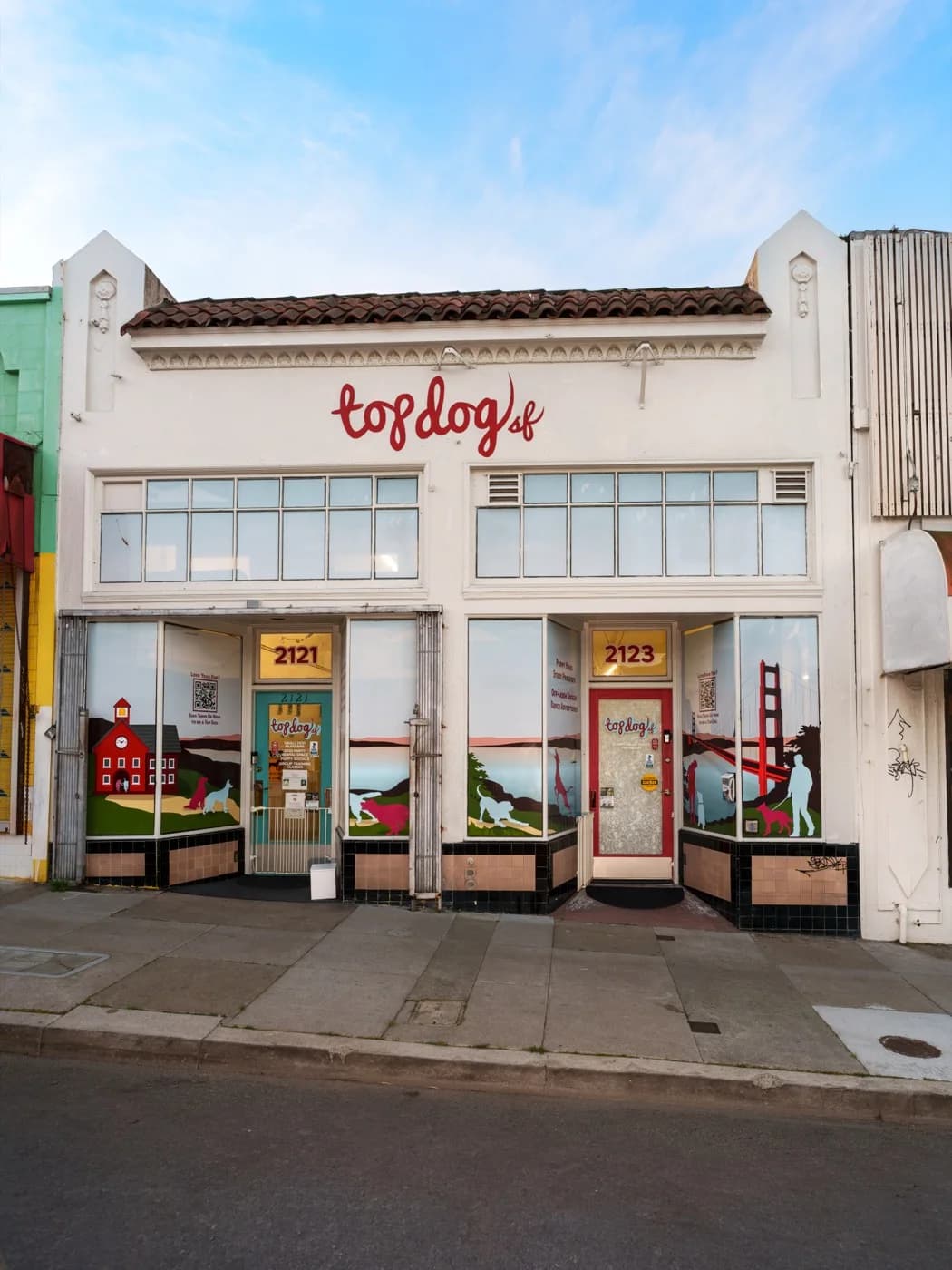 The Top Dog SF storefront at 2121-2123 Taraval Street, Golden Gate Bridge mural painted across the windows